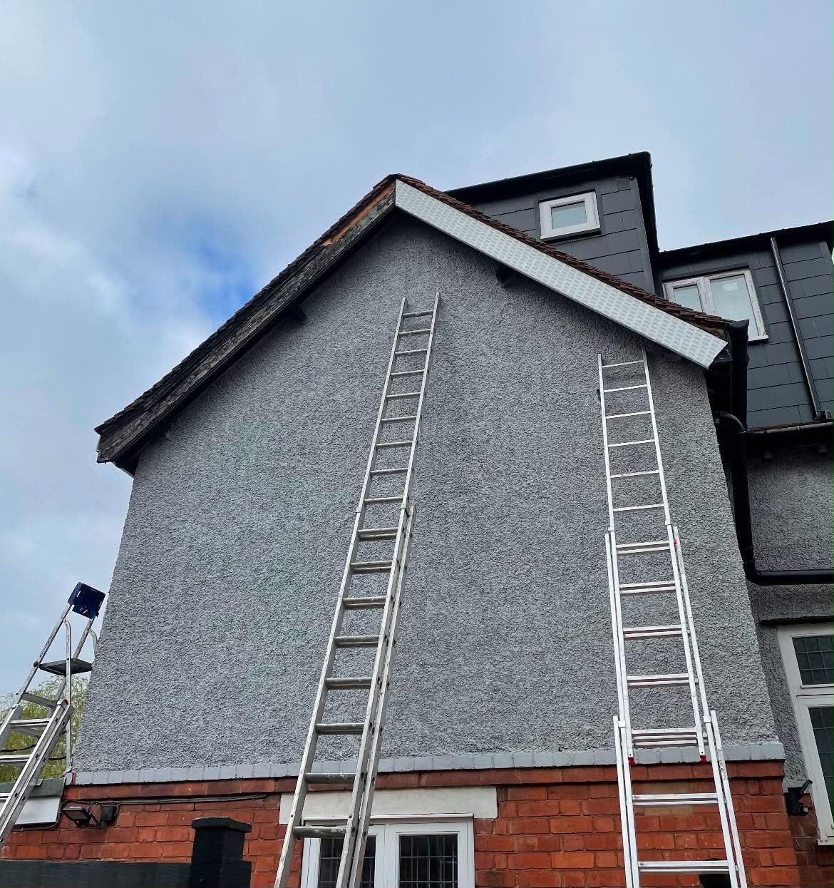 Gable fascia renovation with ladders
