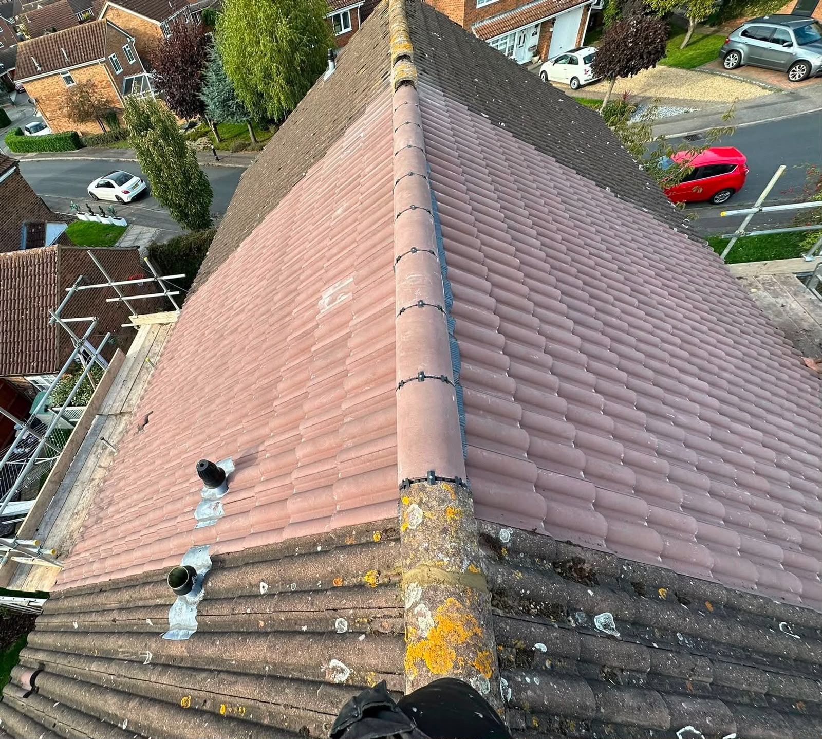 Terracotta tile roof restoration in progress